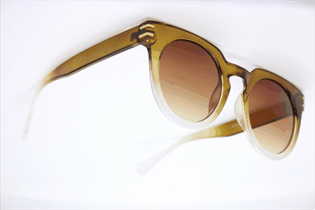 Brun/hvid solbrille brune glas